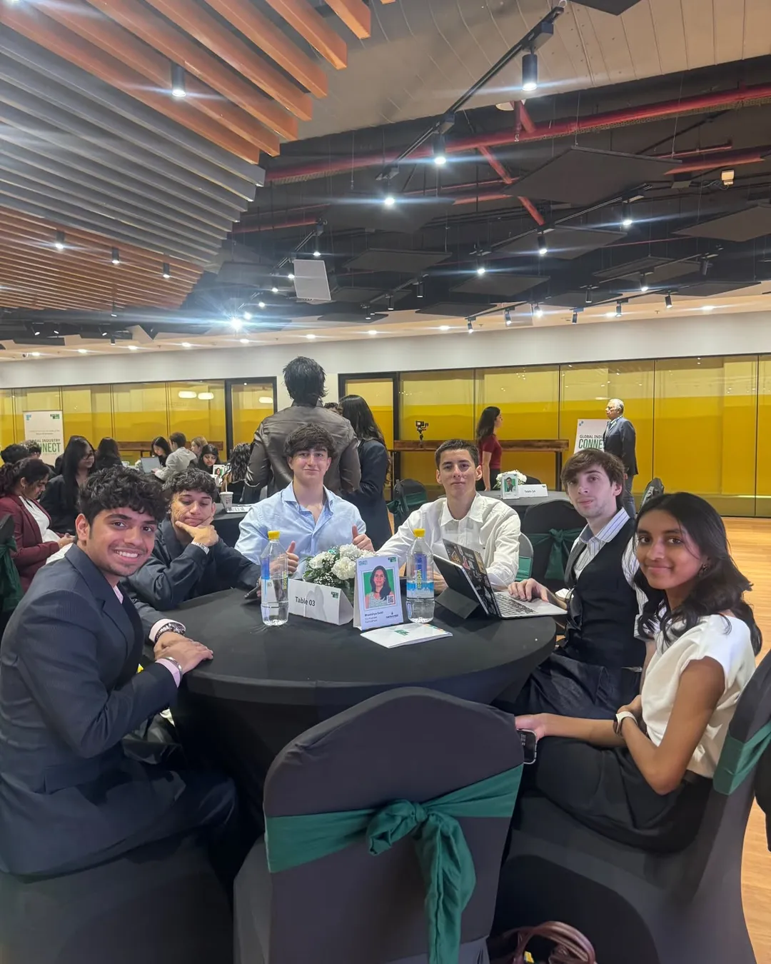 The team around a table at a TETR event