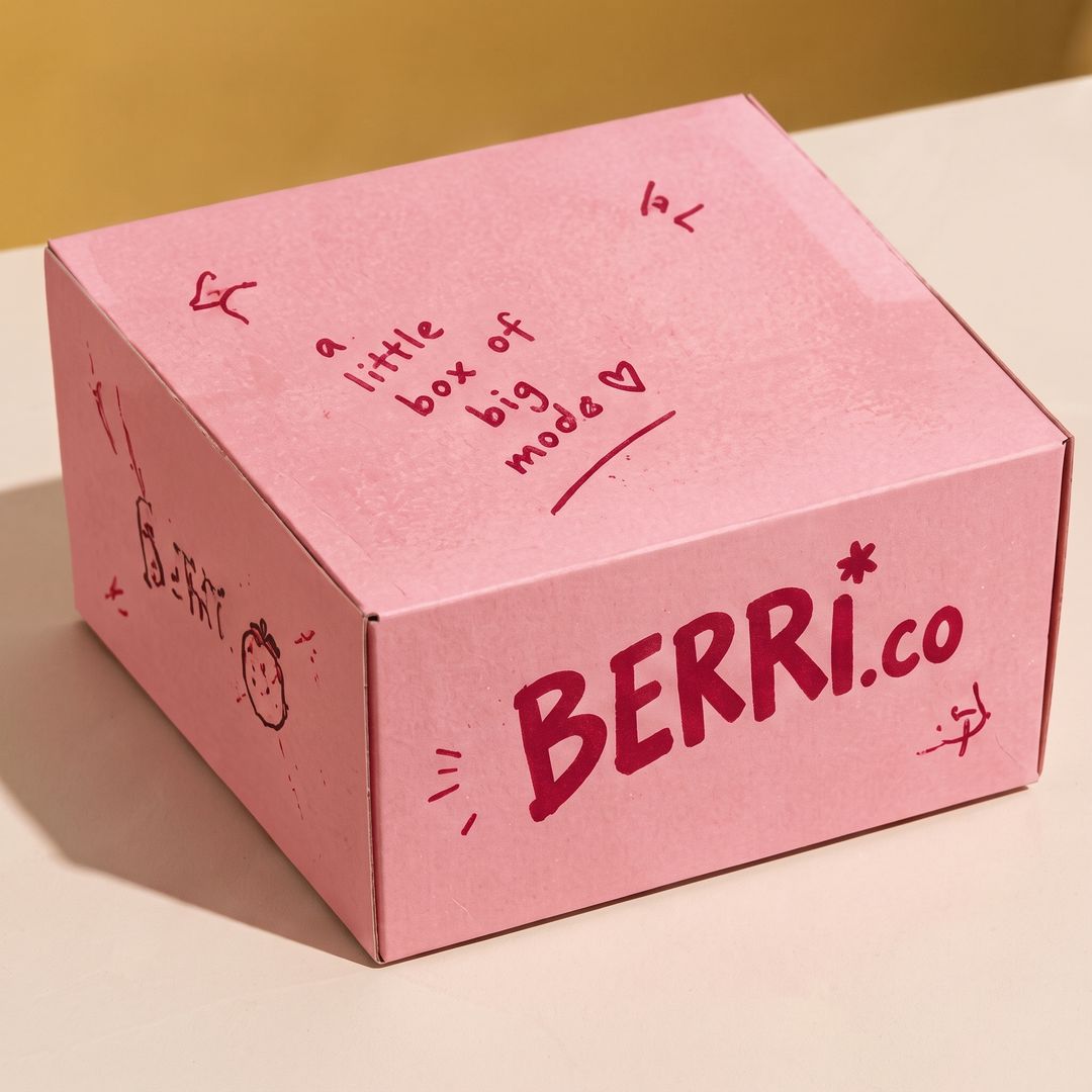 A pink gift box, hand-lettered: a little box of big mood.